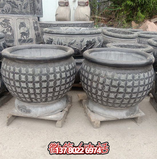 自然美學(xué)結(jié)合青石石雕、浮雕、編織、雕塑的戶外園林魚缸